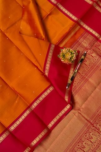 Kanchi Pure Silk Saree In Orange With Contrast Border